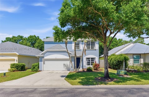 Photo of 3117 SW Solitaire Palm Dr, Palm City, FL 34990 (MLS # A12010614)