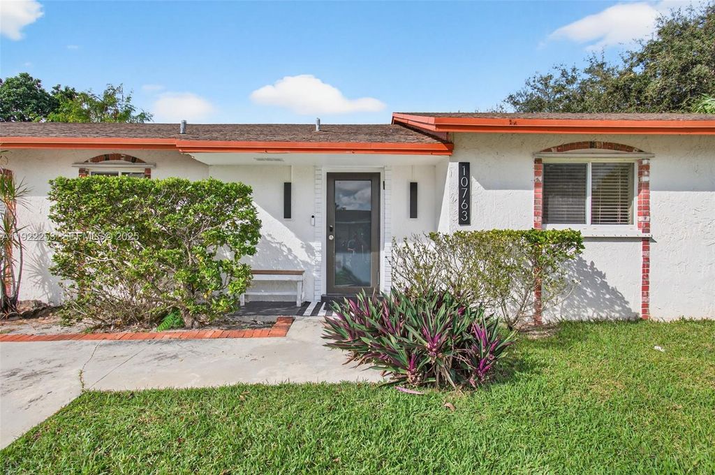 Photo of 10763 Shady Pond Ln, Boca Raton, FL 33428 (MLS # A11922253)