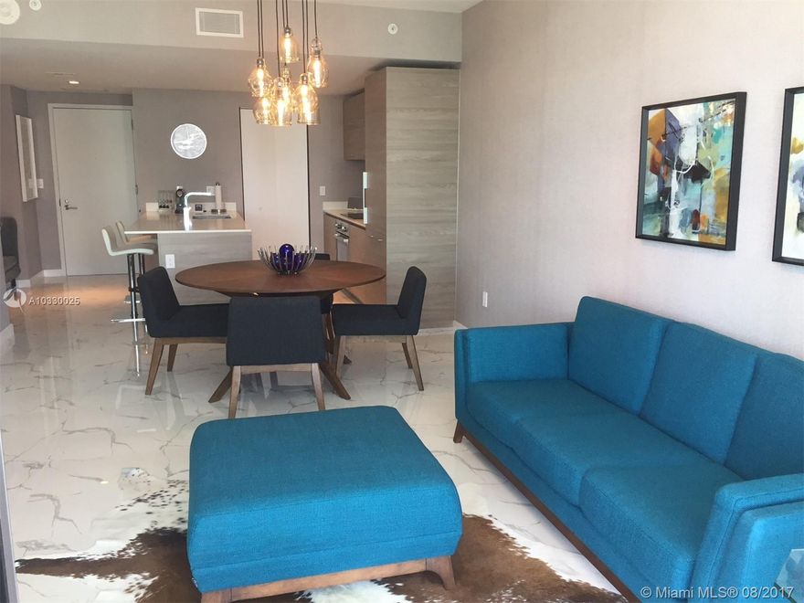 Beautifully furnished including electric shades unit with stunning skyline view. SLS Brickell: amazing gym, playroom, movie theater, 2 pools including a rooftop, valet service, 24 hrs lobby. Located at the heart of Brickell Financial District and walking distance to everything... restaurants, markets, bars, shops, etc Also about 10 minutes drive to the airport and 15 to the beaches. Easy to show