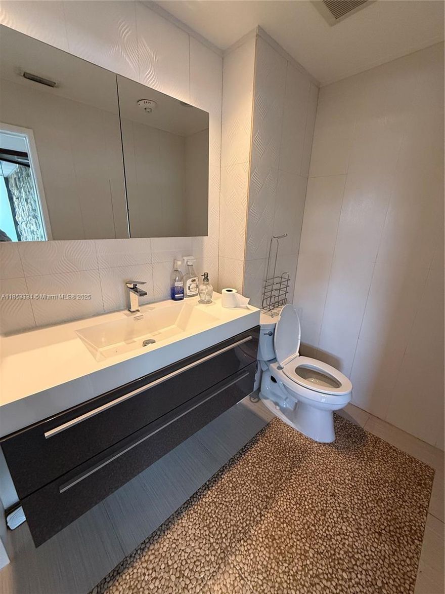 Gardens Corporate Center, a beautifully newly painted building with a brand-new elevator installed as well. Brand new construction, Gardens Residences, a 358-unit apartment building directly across the street. New 5 retail building construction coming in the lot next door in Winter of 2025. High foot traffic area with lots of improvements coming along.