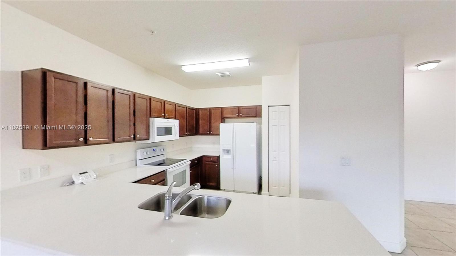 Spacious 3 Bed / 2.5 Bath condo located in the desirable Century Park West community. Features include a modern kitchen with quartz countertops, refrigerator, stove, washer & dryer, and central A/C. Comes with 2 assigned parking spaces. Community amenities include a swimming pool. Prime location just minutes from FIU, top-rated schools, International Mall, Dolphin Mall, and major highways for easy commuting.