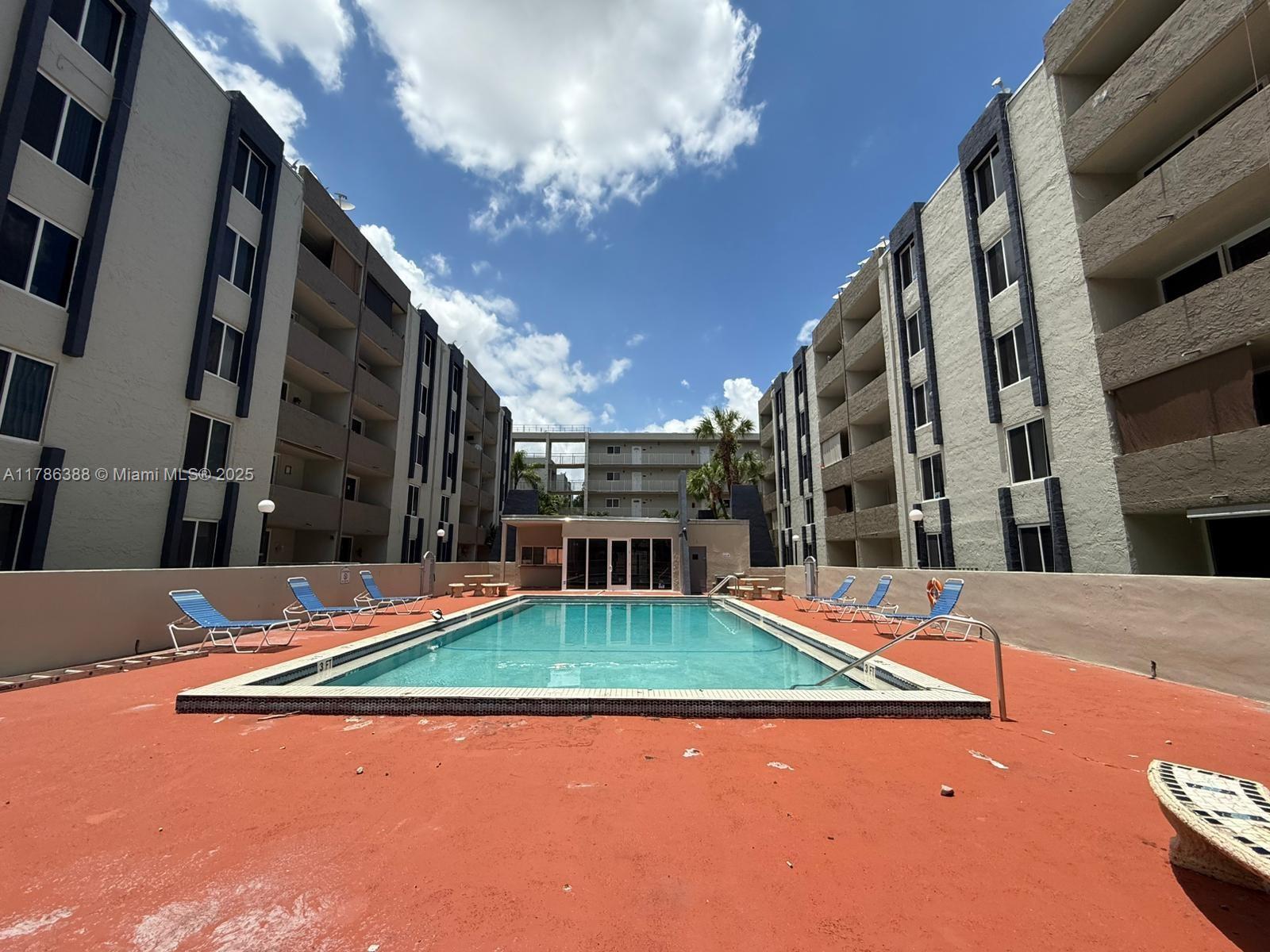 Beautiful spacious 2 bedroom2 bath condo.ceramic tile flooring, kitchen with stack-able washer/dryer as well as both bathrooms. Unit Freshly painted. Open balcony Complex is gated with a Security Guard and patrolling guard throughout the complex. Close to expressway and shopping. Complex contains several amenities four your enjoyment. Pool, Child Playground, Basketball court and Clubhouse.