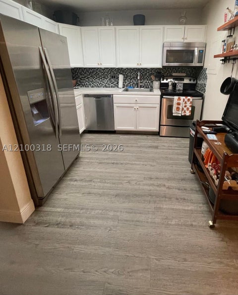 Photo of 7100 NW 17th St #421, Plantation, FL 33313 (MLS # A12100318)