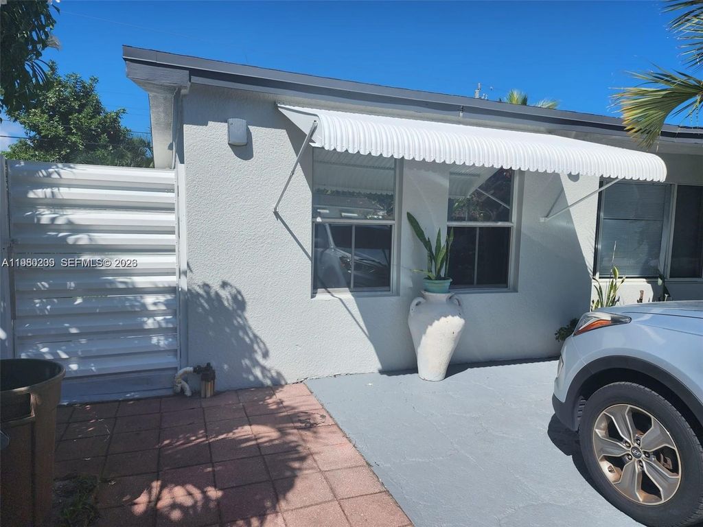 Photo of 1561 NE 29th St, Pompano Beach, FL 33064 (MLS # A11980209)