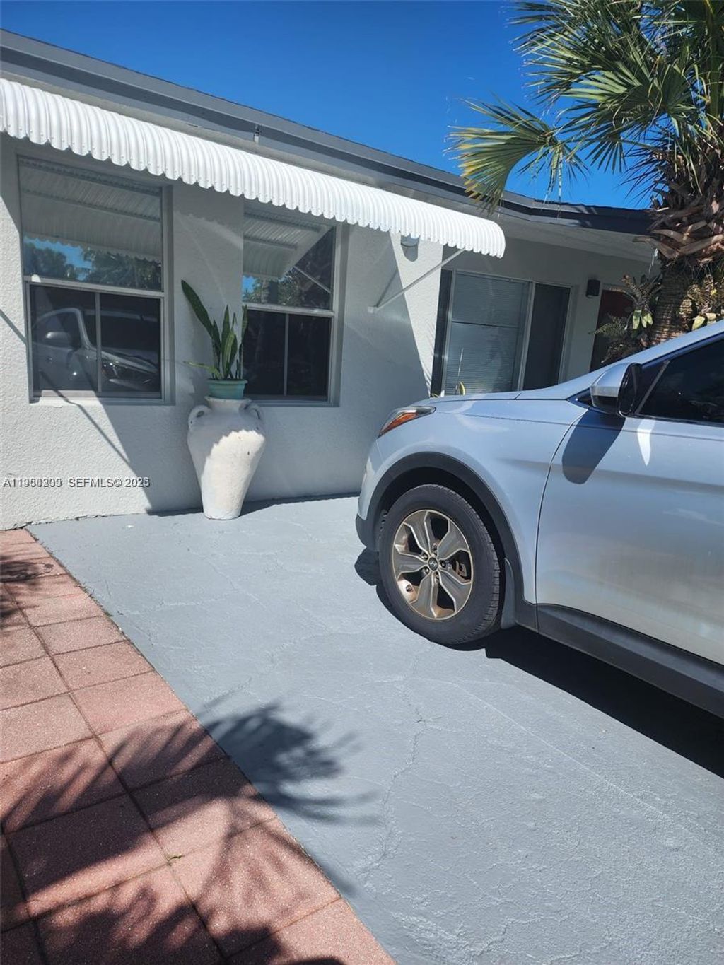 Photo of 1561 NE 29th St, Pompano Beach, FL 33064 (MLS # A11980209)