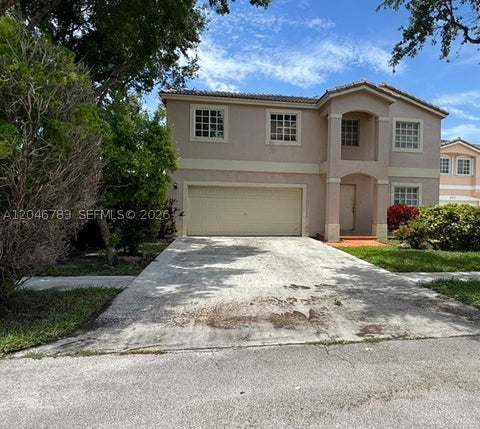 Photo of 10275 SW 24th St, Miramar, FL 33025 (MLS # A12046783)