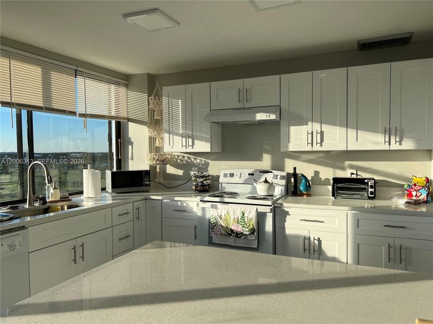 This 2/2 Yorktown penthouse boasts stunning views, with the golf course visible from the kitchen and living room, and Downtown West Palm Beach from the balcony. The unit offers a roomy open layout, a sleek modern kitchen with island seating, and updated flooring. Located in a secure building, it’s just minutes from all the best that West Palm has to offer.