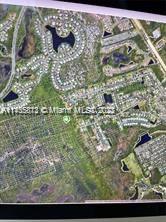 HUGE LOT IN POINCIANA GARDENS WITH ALMOST HALF OF ACRE SURROUNDED FOR GOOD HOUSES, ****GOOD INVESTMENT.***SELLER IS SELLING AS IS. *** RAW LAND**BUYER/ BUYER'S AGENT IS RESPONSIBLE TO CHECK WITH THE CITY/COUNTY ANY INFORMATION REGARDING TO THIS LOT, 772-288-5495. SELLER DOES NOT HAVE ANY OTHER INFORMATION.