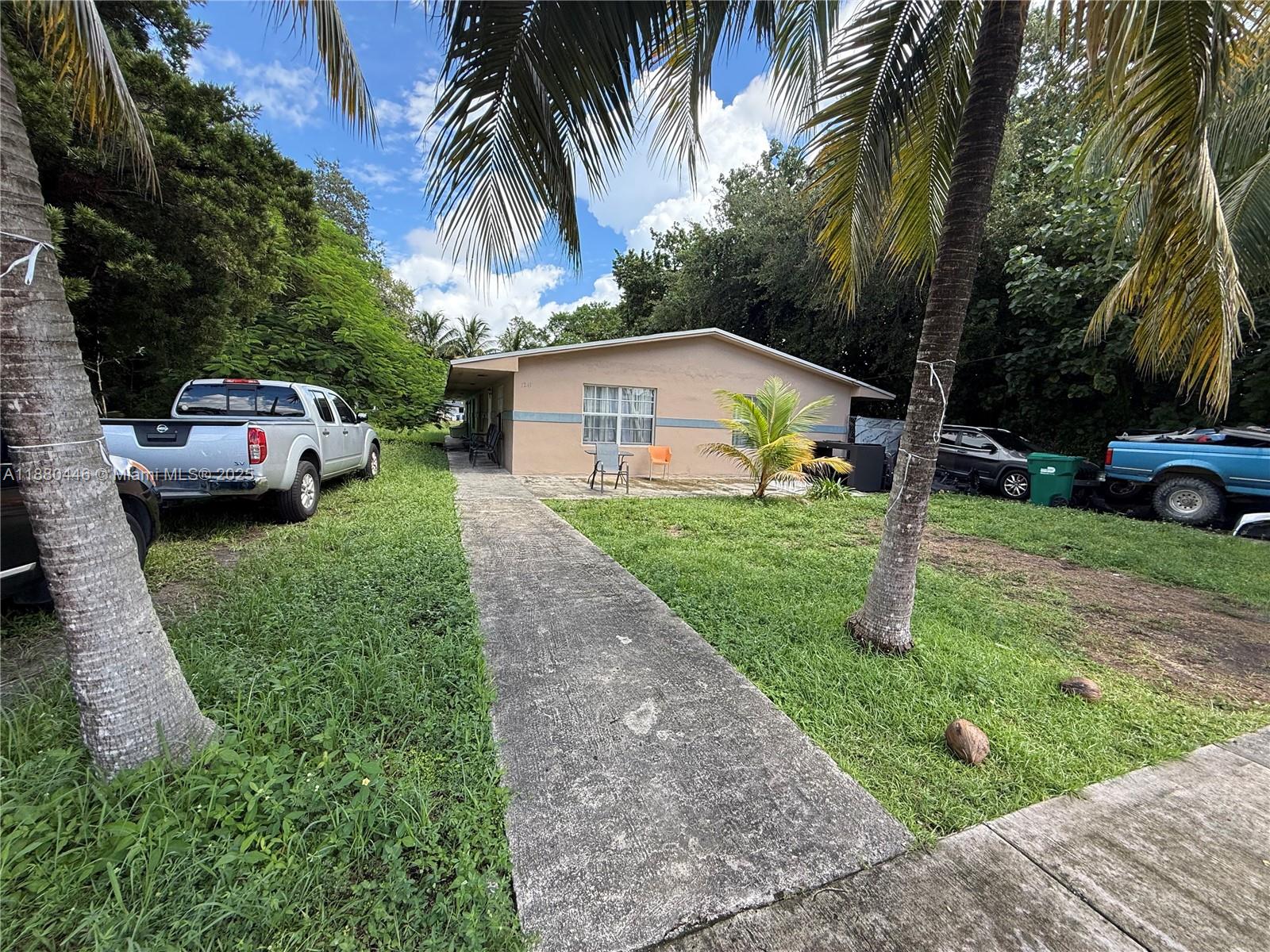 Spacious 2-bedroom, 1-bath home for rent featuring a bright open living room, large kitchen, and convenient laundry area. Huge fenced yard with grass, perfect for entertaining, kids, or pets.