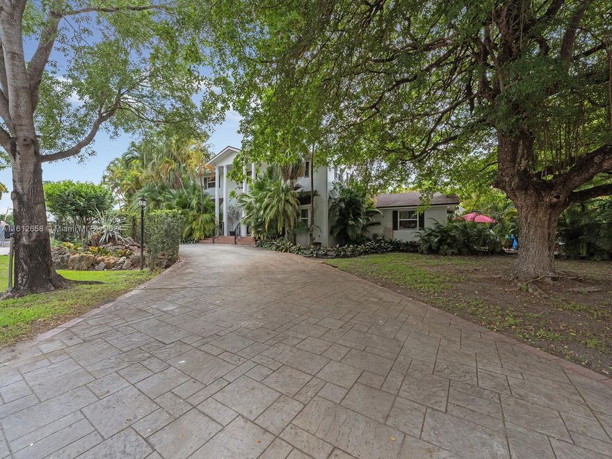 Discover your dream single-family residence, ideally located just off Bird Road and adjacent to the Florida Turnpike. This two-story gem boasts 5 spacious bedrooms and 4 pristine bathrooms, perfect for a growing family. Situated on over an acre of land, the property offers ample space for both relaxation in the heart of the City. Lot includes over an acre of residential beauty, providing blend of luxury and nature connection. Don't miss the chance to own a piece of paradise