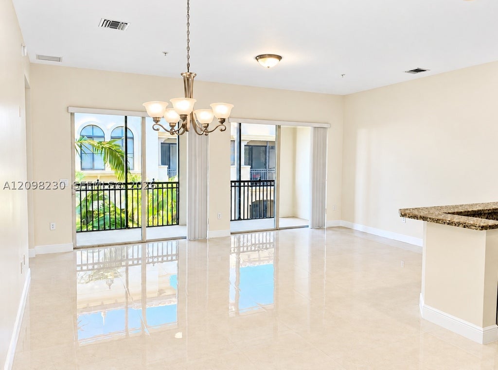 Photo of 2925 NW 126th Ave #1-411, Sunrise, FL 33323 (MLS # A12098230)