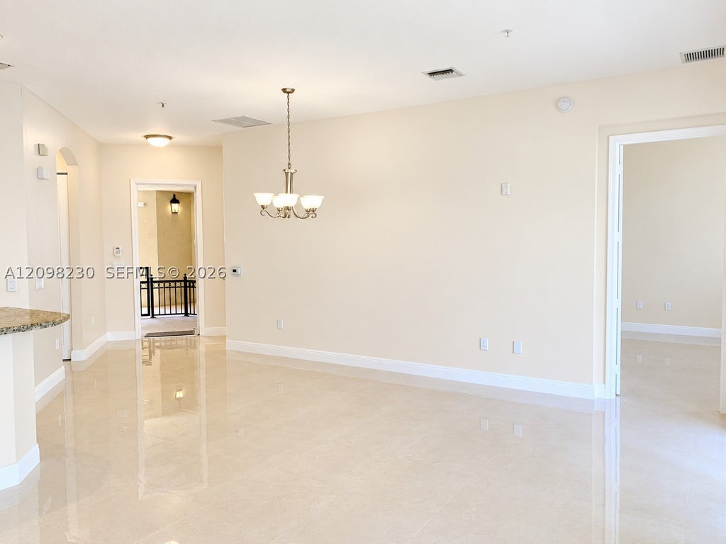 Photo of 2925 NW 126th Ave #1-411, Sunrise, FL 33323 (MLS # A12098230)
