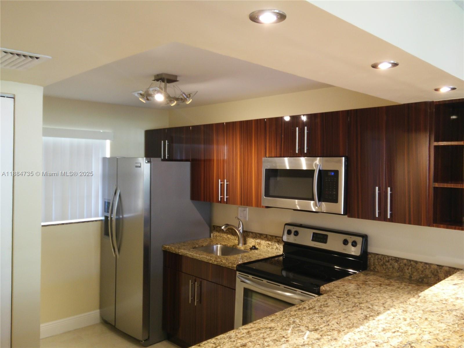 Location...location. This very well-maintained apartment is in a very quiet community with plenty of guest parking. It has a screened balcony on the first floor and a small storage area. It is close to many schools, a casino, a stadium, supermarkets, expressways, and much more.