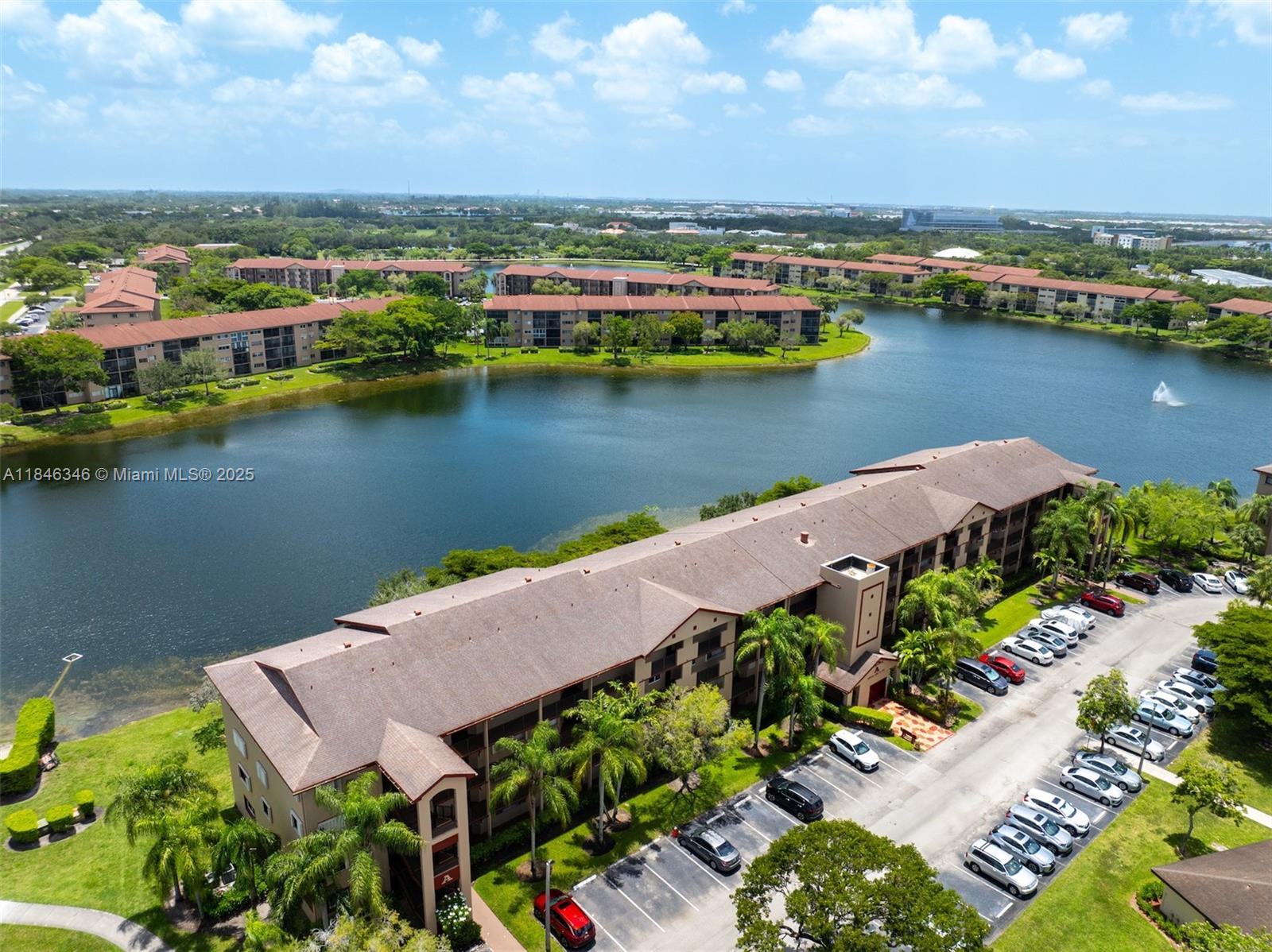 Experience resort-style living in Century Village! This 2 bed / 2 bath waterfront condo was lightly used by its original seasonal owner. Features tile and carpet flooring, in-unit washer/dryer, and 2016 AC. Building recently repainted inside and out. Includes one assigned parking spot and plenty of guest parking. Enjoy top-tier amenities in this gated 55+ community (occupants 18+ welcome): clubhouse, theater, pools, gyms, tennis & more. HOA covers cable, internet, and water. Reserves in place, no special assessments. Min credit score: 650. Rent immediately—no waiting period!