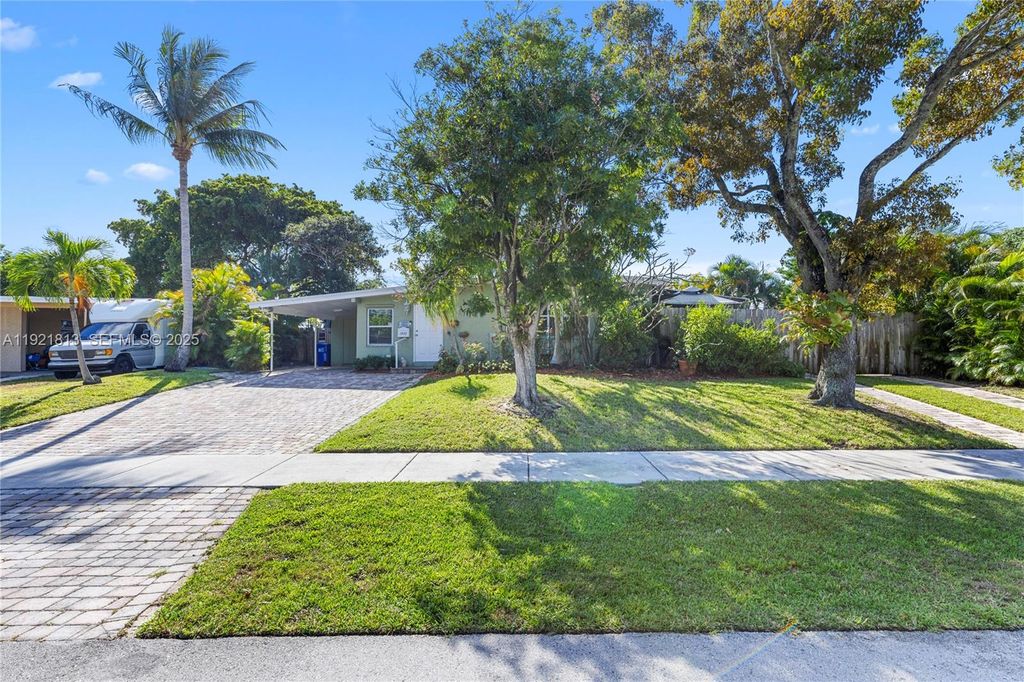 Photo of 1410 NE 40th Ct, Pompano Beach, FL 33064 (MLS # A11921813)