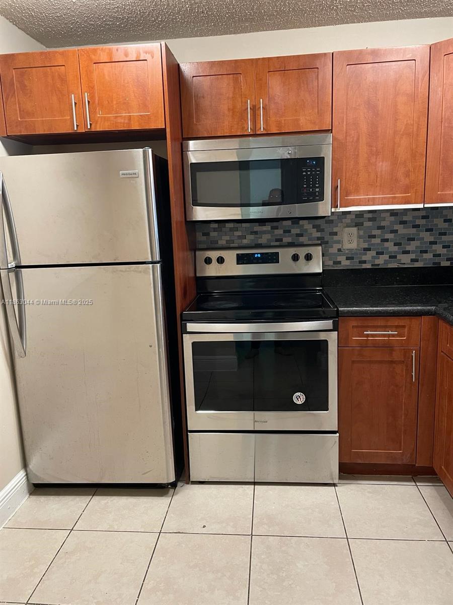 Charming 1-bedroom unit located on the 1st floor in the gated community of Montecarlo. Enjoy serene views of the pool right from your doorstep. The unit features a modern kitchen equipped with stainless steel appliances, offering both style and functionality. Conveniently located near major highways—this is the perfect place to call home!
