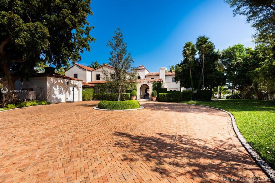 This quintessentially Mediterranean WF estate has been improved, extended & modernized to form a 7BD/5.5BA pristine, move-in-ready, architecturally-rich home. Designed by John & Coulton Skinner, this private 32,019SF estate w/ 156.4' WF has spectacular grounds, heated pool/spa, dock & lifts. Sun-drenched living spaces include gourmet eat-in kitchen, open multi-space family rm w/ built-in bar, formal WF dining & living rm. Original & modern details blend seamlessly to enhance the visual impact upon entering through a romantic center courtyard loggia w/ original iron work, wood beamed ceilings & fountain. Grand 2nd floor master suite w/ his/hers walk-in closets, extraordinary master bath+private terrace. This home is ideal for a large family & entertaining, offering style, comfort & luxury.