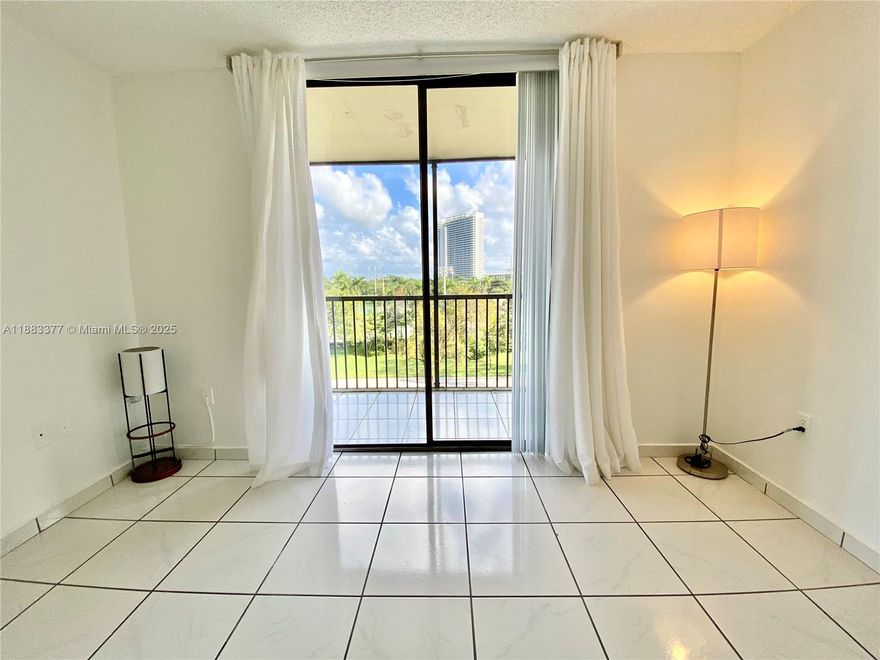 Light apartment has a screened balcony, walk-in closet, tile throughout, has plenty of guest parking. Property is secure and is approximately 200 yards across for the historic Ancient Spanish Monastery and a few blocks away from Greynold's Park, which offers nature trails, a fun-filled playground for the kids, fishing out of a rock quarry, picnicking, bird-watching, and the Greynolds Golf Course. Close to FIU, AVENTURA MAL AND BEACHES.