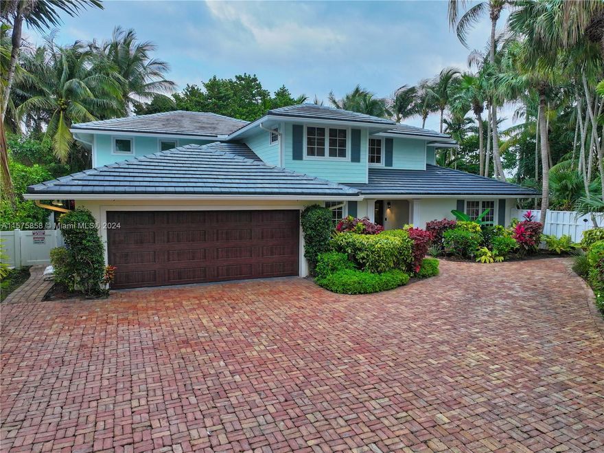 Stunning 5 bedroom/ 4 bath beach house in Sun & Surf neighborhood of East Boca. One of only 16 homes backing onto the Red Reef Executive Golf Course. Off A1A  across from the beach situated on an expansive oversized lot at the end of a quiet cul-de-sac. Remodeled in 2017 and further enhanced in 2022,  home exudes sophistication and charm. Features impact windows and doors, exquisite flooring, vaulted ceilings, Calacatta marble countertops and Wolf and Sub-Zero appliances. Lower level hosts two spacious bedrooms with ample walkin closets. Upstairs - three additional bedrooms, including the luxurious master suite with coffee bar, expansive closet space, and a spa-inspired master bath. Outside to an entertainer's paradise, where lush tropical gardens, expansive patios, heated pool and spa.