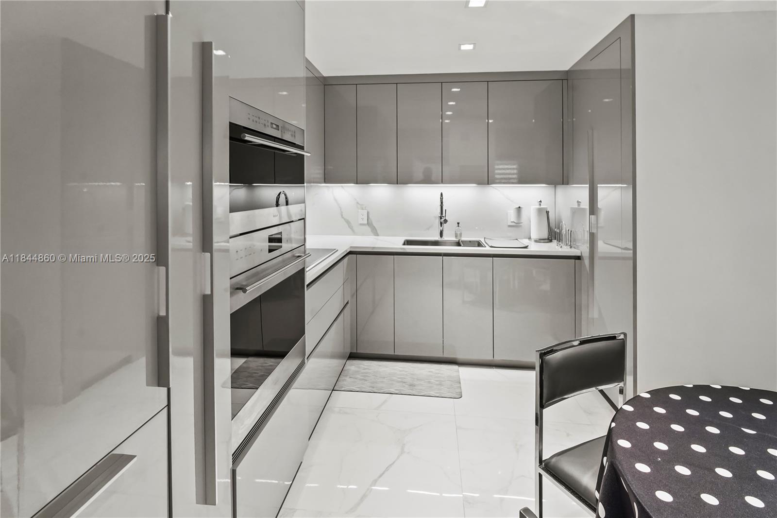 Completely remodeled direct oceanfront condo with stunning, unobstructed views! This luxurious residence features marble floors, a chef's kitchen with Sub-Zero & Wolf appliances, brand new washer & dryer, updated electrical panel, and new hot water heater. Spa-like baths with frameless glass showers. Spacious and light-filled, with private balcony overlooking the Atlantic. Full-service building with beach access, pool, gym, and 24/7 security. Live steps from Surfside, Bal Harbour, and world-class dining and shopping. Move-in ready coastal retreat!