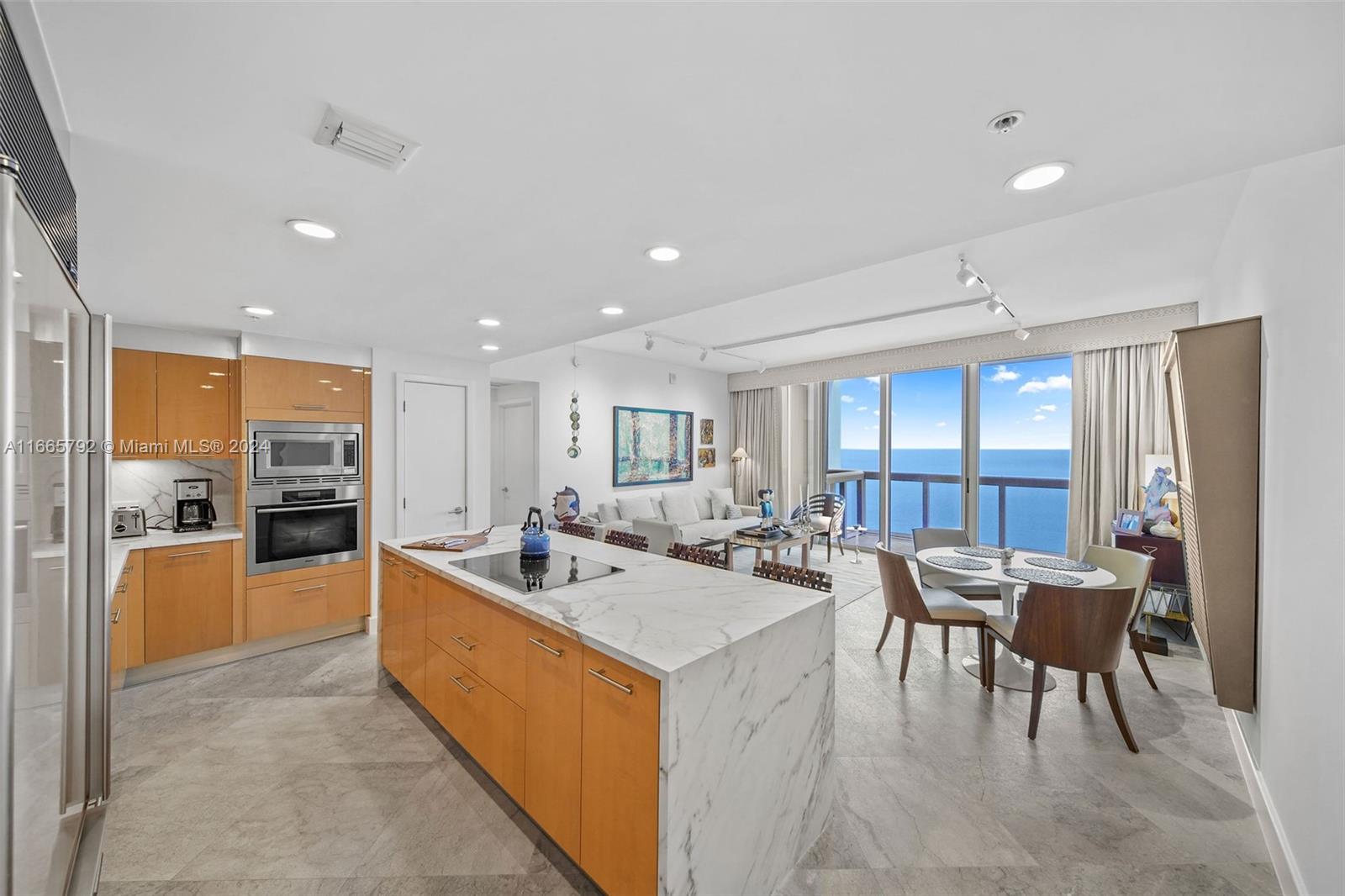 DIRECT OCEAN VIEWS FROM ALL ROOMS in prestigious North Tower of renowned Carillon Miami Wellness Resort. Beautifully upgraded with designer furnishings included (some exclusions, i.e. artwork) 2 bed 2.5 bath split plan unit with long, deep balcony spanning living room and second bedroom. Highly desired largest 2 bedroom floor plan. Full use of 70,000 sqft fitness and spa center. Classes offered 7-days-week from morning until evening. Luxuriate in a myriad of wet therapies to relax your mind, body, and soul. Concierge, 4 pools, restaurant, Corner Store, poolside cafe, beach service, salon, boutique, wellness staff, 24-hour security, valet. Walking neighborhood with all conveniences, Publix across the street, restaurants, drug stores. Make every day a luxury wellness vacation. (PRICE FIRM.)