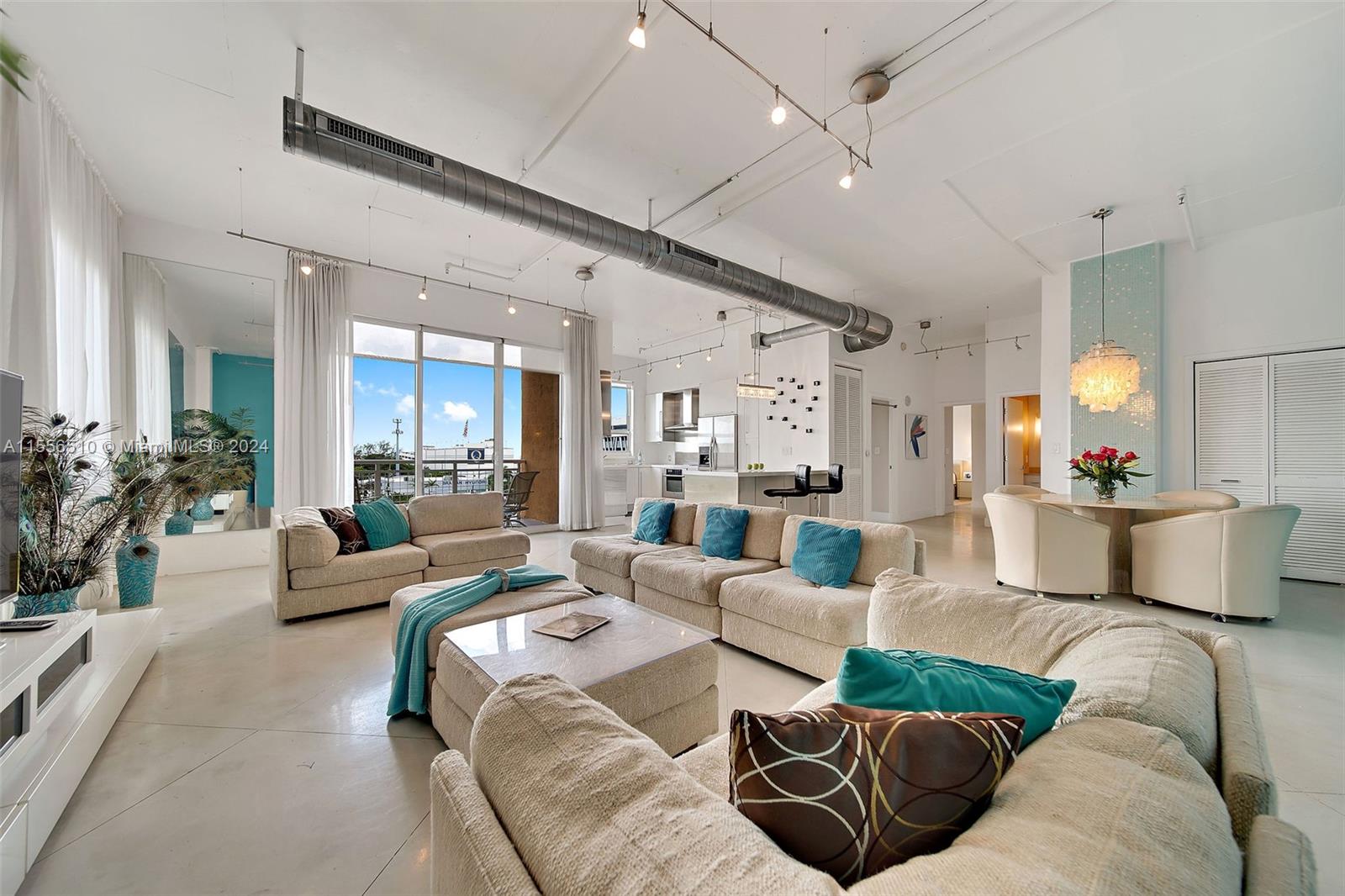 Rarely available loft-style unit. Beautiful, unique & spacious 2/2, Corner unit with oversized balcony w/spectacular City Views and amazing sunsets, open floorplan loft-style condo-11-foot ceiling! Large walk-in closets. Updated kitchen offers stainless Miele appliances, quartz counters and bright open living, dining, kitchen area. The master suite has a large walk-in closet outfitted with closet organizers. Cite condo offers 24/7 security. Huge gym, heated pool, spa, clubhouse, valet parking, and more. Located across from Bayfront Margaret Pace Park offering tennis, basketball, Dog Park, Close to major transportation and highways. Also, the stairs and elevator are around the corner from the unit, so easy to use stairs to parking garage- One parking space included with unit.