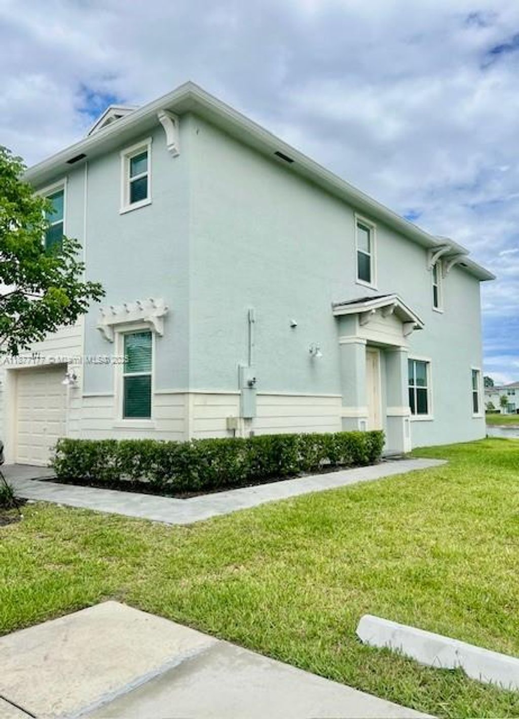 Photo of 871 SE Grovebush Ln, Port St Lucie, FL 34984 (MLS # A11877177)