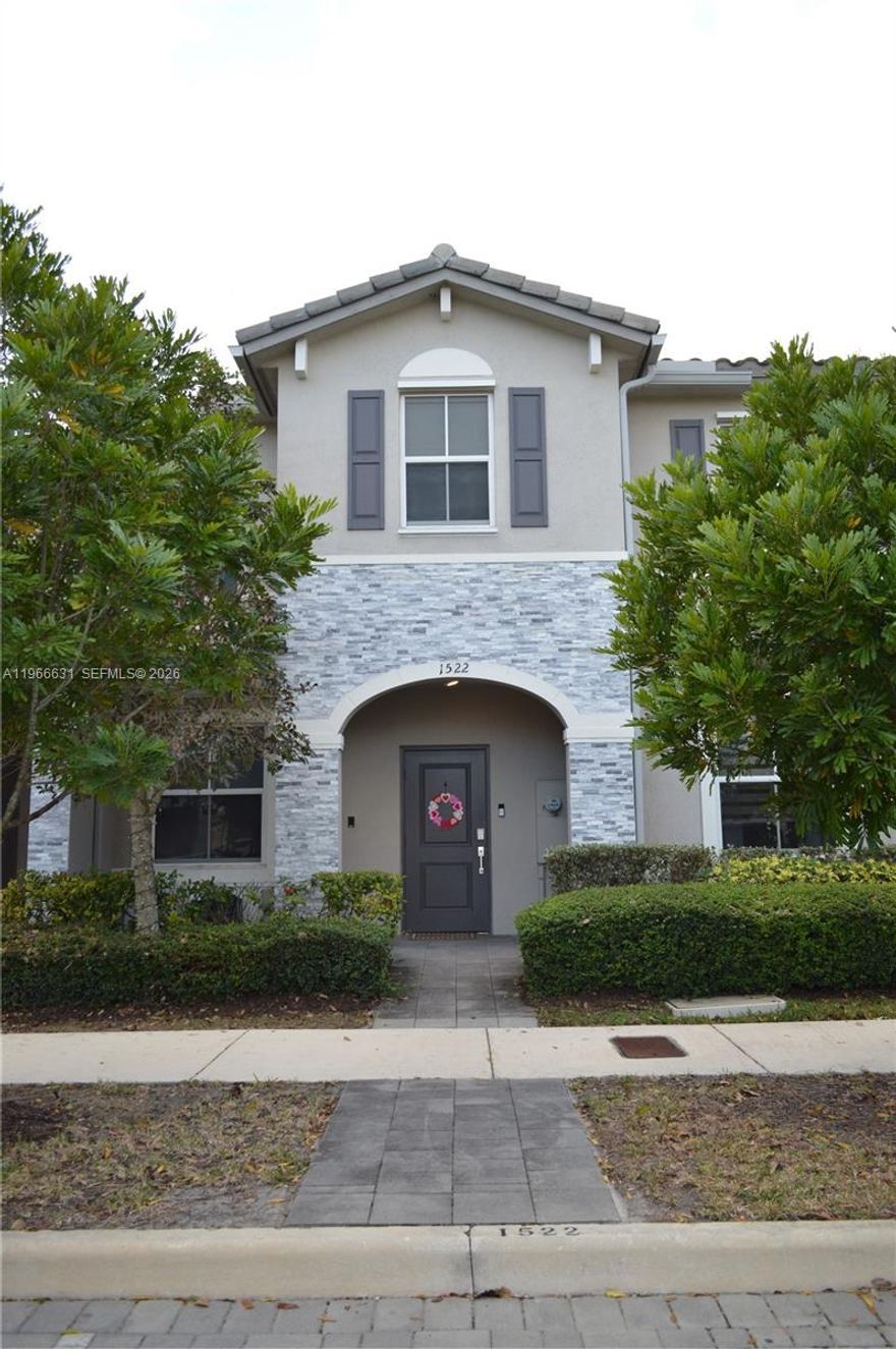JUST REDUCED! Motivated Seller! Welcome to this beautifully maintained 3-bedroom, 2½-bath townhome in Homestead, Florida, built in 2020 with award-winning design for comfortable, modern living. Nestled in a quite corner location and no backdoor neighbors. Ideally located just minutes from the Florida Turnpike, this home offers easy access to shopping, dining, and local hospitals—plus you’re only about 20 miles from the breathtaking waters of the Florida Keys.

This two-story split-level layout features spacious living areas filled with natural light, creating the perfect space for both relaxing and entertaining. The kitchen and living areas flow seamlessly to a generously sized private patio—ideal for weekend gatherings or quiet evenings outdoors.

Enjoy added value and peace of mind with a new water softener system and reverse osmosis filtration system, enhancing comfort and water quality throughout the home. The property also includes two dedicated parking spaces for convenience.

Residents enjoy access to outstanding community amenities, including a resort-style pool and spa, cabanas, elegant clubhouse, fully equipped fitness center, and scenic lakes—offering the perfect blend of relaxation and recreation right outside your door. All for a very low monthly HOA of $238 per month!

Move-in ready and meticulously cared for, this townhome combines location, upgrades, and lifestyle—making it the perfect place to call home.