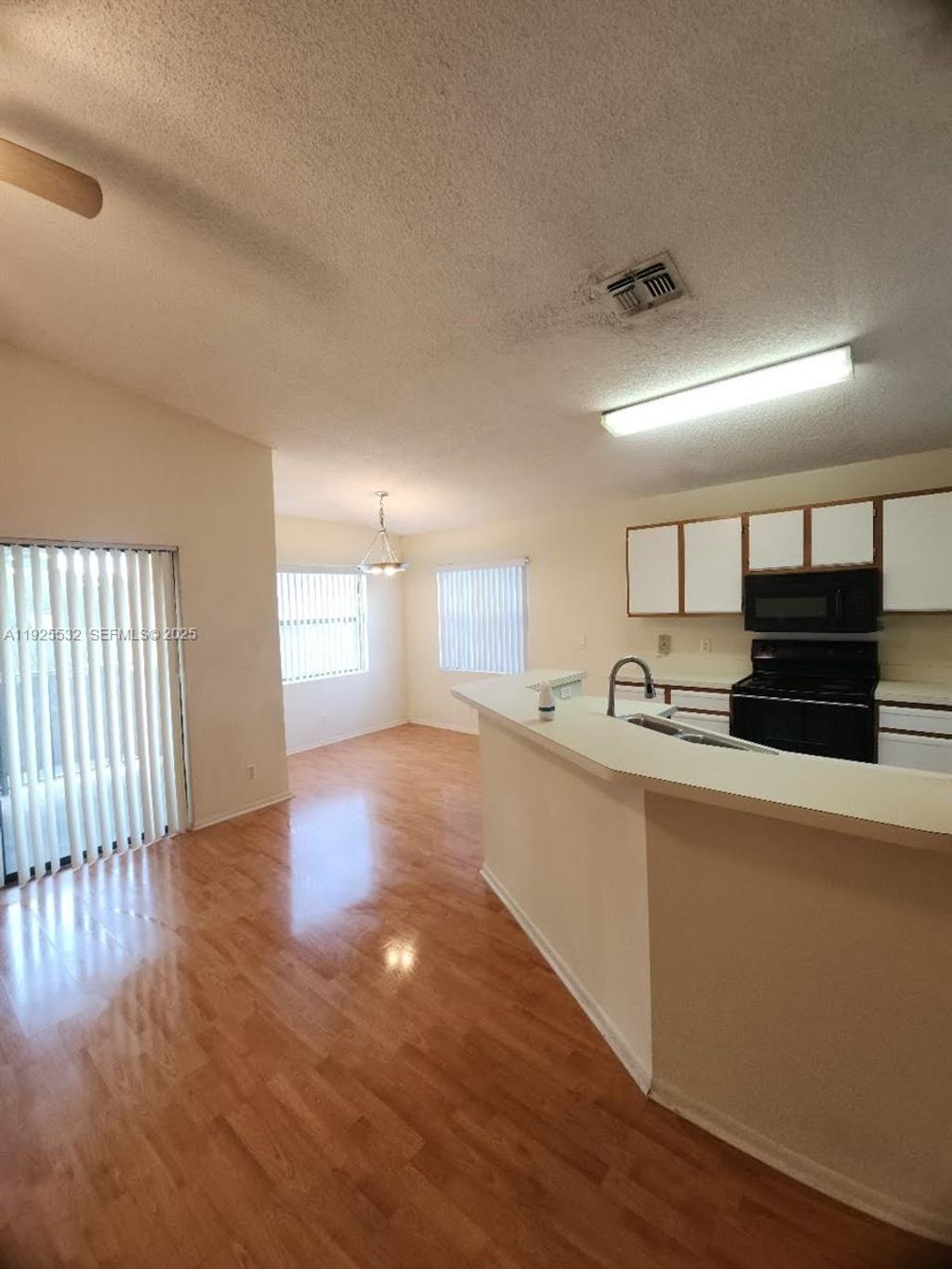 Photo of 9999 Summerbreeze Dr #424, Sunrise, FL 33322 (MLS # A11925532)