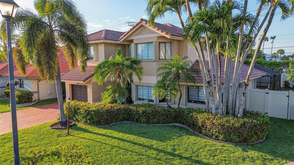 Photo of 11501 SW 9th Ct, Pembroke Pines, FL 33025 (MLS # A11989751)