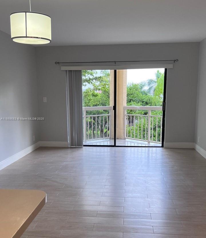 Doral beauty with new bathroom, new porcelain flooring throughout, stainless steel appliances, and new A/C. Water is included, washer and dryer in unit. Enjoy the newly tiled floor, open balcony with direct pool view, and much more. Complex is gated with security and card entry. There are great amenities such as tennis, pool, gym, etc. Location is very convenient, close to downtown Doral, expressways, restaurants, shopping and minutes from the airport.