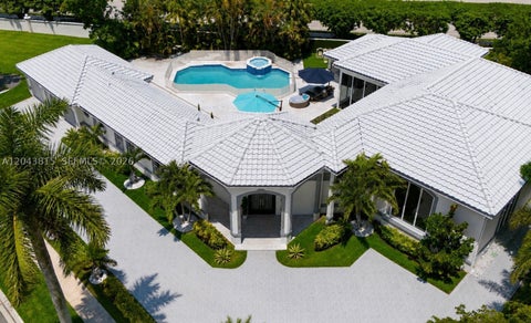 Photo of 2673 NW 64th Blvd, Boca Raton, FL 33496 (MLS # A12043815)