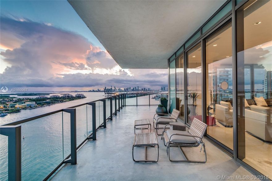 The finest luxury condo in South Beach offering unobstructed panoramic views of the Atlantic Ocean, Downtown skyline, & picturesque South Beach & Fisher Island. Situated in the S/W/N corner at Apogee, this unit is an absolute perfection & a true representation of the "Miami Beach luxury condo living." Its wide-open floor plan & high ceilings allow for the optimal exposure of the views in every area of the residence. Features include, a chef's kitchen, raked granite & hand-plaster walls, concrete floors, surround-sound system, & split floor plan with a master on one side & 2 guest beds on the other. Enjoy the ocean breeze & mesmerizing sunsets from the 11-foot wide wrap-around terrace totaling 2,441 SF of exterior. Private summer kitchen, private elevator, & 2.5-car A/C garage.