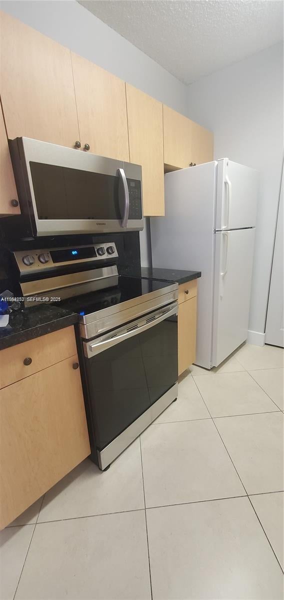 Photo of 10288 S Fox Trail Rd S #309, Royal Palm Beach, FL 33411 (MLS # A11934852)