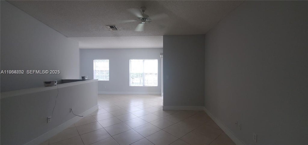 Photo of 10288 S Fox Trail Rd S #309, Royal Palm Beach, FL 33411 (MLS # A11934852)