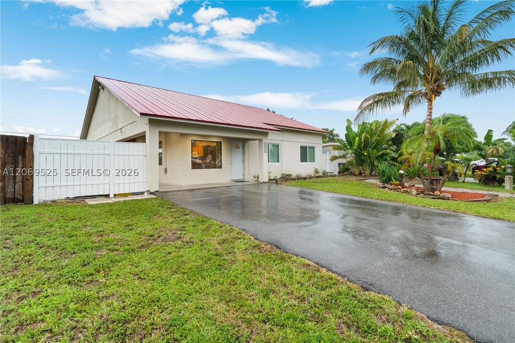 Photo of 5677 Maypop Rd, West Palm Beach, FL 33415 (MLS # A12069525)