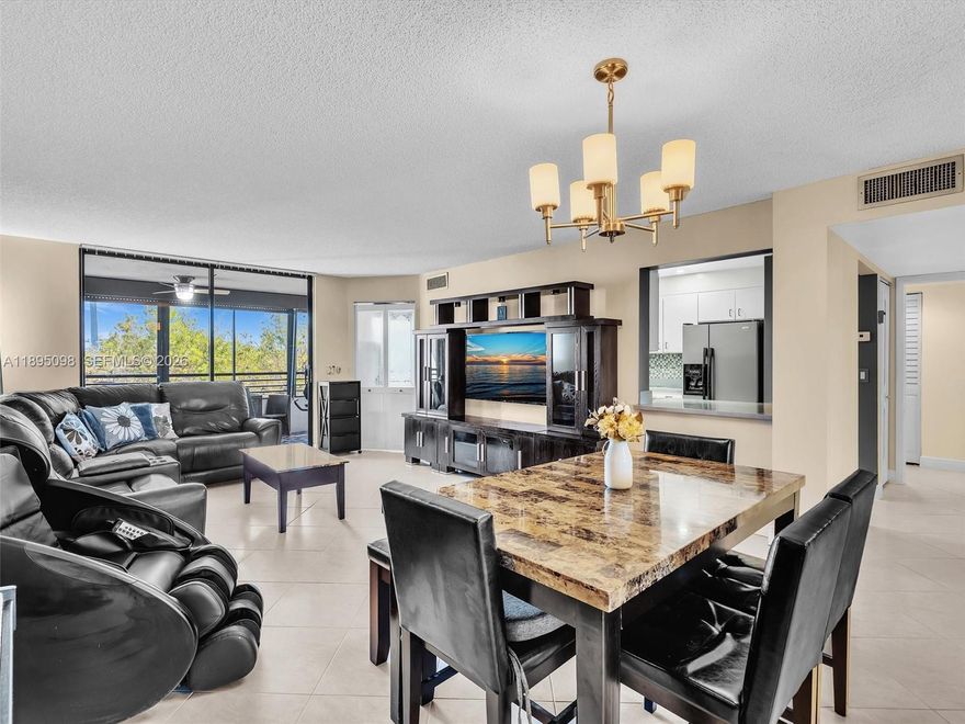 Discover one of Hollywood’s hidden gems—this top-floor condo in coveted Building J at Sheridan by the Beach. The moment you walk in, natural light and sweeping views set the tone. From your balcony, you can see the treetops of West Lake Park all the way to Hollywood Beach, and a peaceful pond below teeming with local wildlife. It’s the kind of view that makes every day feel a little calmer.

Inside, the layout is spacious and comfortable. The oversized primary bedroom features a custom walk-in closet, and the large second bedroom has its own walk-in as well. Both bathrooms are updated with timeless finishes, giving the home a clean, move-in-ready feel. The galley kitchen opens to a bright breakfast nook—shown as a home office in the photos—making the space flexible for work or dining.

The community offers true resort-style living with two heated pools, four saunas, two clubhouses, a fitness center, and tennis and pickleball courts. You’re close to everything: shopping, parks, major highways, and of course, the beach just minutes away.

Strong association financials make low-down-payment mortgages possible, and this condo even qualifies for a 5% down program. If you’re looking for a peaceful, beautifully maintained home near the beach with views that genuinely inspire, this is the one.