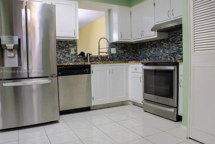 Beautifully upgraded 2-bedroom, 2-bath home featuring a modern kitchen, updated bathrooms, and spacious walk-in closets. Enjoy the convenience of an in-unit washer and dryer plus an extra storage room. The highlight is a large enclosed tiled patio, perfect for relaxing or entertaining. Move-in ready and designed for comfort with plenty of storage throughout. HOA requires a minimum 650 credit score.