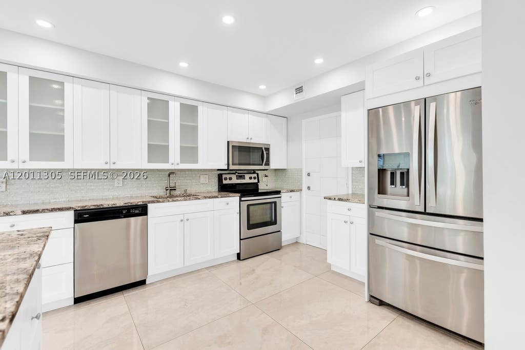 Photo of 300 Diplomat Pkwy #204, Hallandale Beach, FL 33009 (MLS # A12011305)
