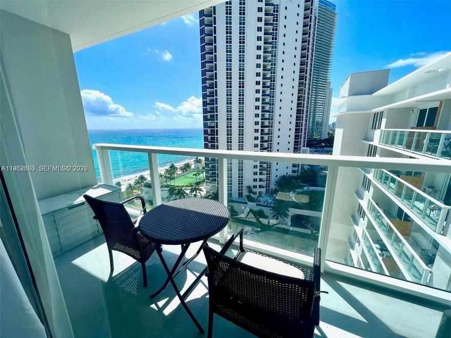 Incredible oceanfront views from this 11th-floor private-balcony studio in Sunny Isles Beach. Enjoy breathtaking panoramic ocean and city vistas from this beautifully furnished, turnkey residence. The unit is not enrolled in the hotel program, offering flexibility for personal use or rental. Features include tile flooring throughout and a newer A/C system. Ideally located just minutes from Aventura Mall, shopping, dining, and entertainment.