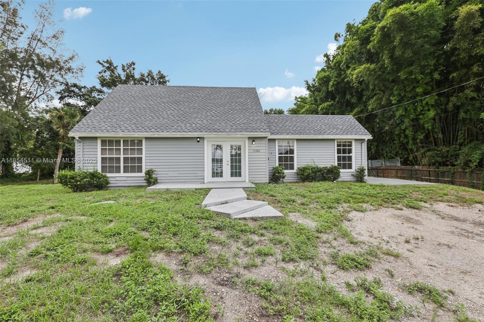 Beautiful 4BD/3BA large lot home in The Acreage with no HOA! This spacious split floor plan features vaulted ceilings, tile flooring throughout, and an open layout filled with natural light. The kitchen offers stainless steel appliances, plenty of cabinet space, and a breakfast bar overlooking the main living area—perfect for everyday living and entertaining. The primary suite includes a walk-in closet and private bath. Additional bedrooms are generously sized, with one featuring its own full bath—great for guests or multigenerational living. Peaceful location just minutes from shopping, dining, and schools.