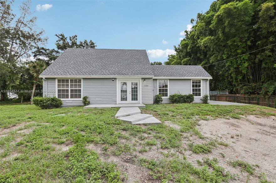 Beautiful 4BD/3BA large lot home in The Acreage with no HOA! This spacious split floor plan features vaulted ceilings, tile flooring throughout, and an open layout filled with natural light. The kitchen offers stainless steel appliances, plenty of cabinet space, and a breakfast bar overlooking the main living area—perfect for everyday living and entertaining. The primary suite includes a walk-in closet and private bath. Additional bedrooms are generously sized, with one featuring its own full bath—great for guests or multigenerational living. Peaceful location just minutes from shopping, dining, and schools.