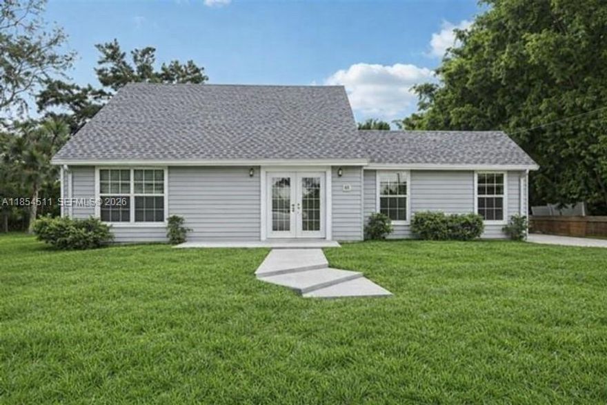 Beautiful 4BD/3BA large lot home in The Acreage with no HOA and a NEW ROOF (2025)! This spacious split floor plan features vaulted ceilings, tile flooring throughout, and an open layout filled with natural light. The kitchen offers stainless steel appliances, plenty of cabinet space, and a breakfast bar overlooking the main living area—perfect for everyday living and entertaining. The primary suite includes a walk-in closet and private bath. Additional bedrooms are generously sized, with one featuring its own full bath—great for guests or multigenerational living. Peaceful location just minutes from shopping, dining, and schools.