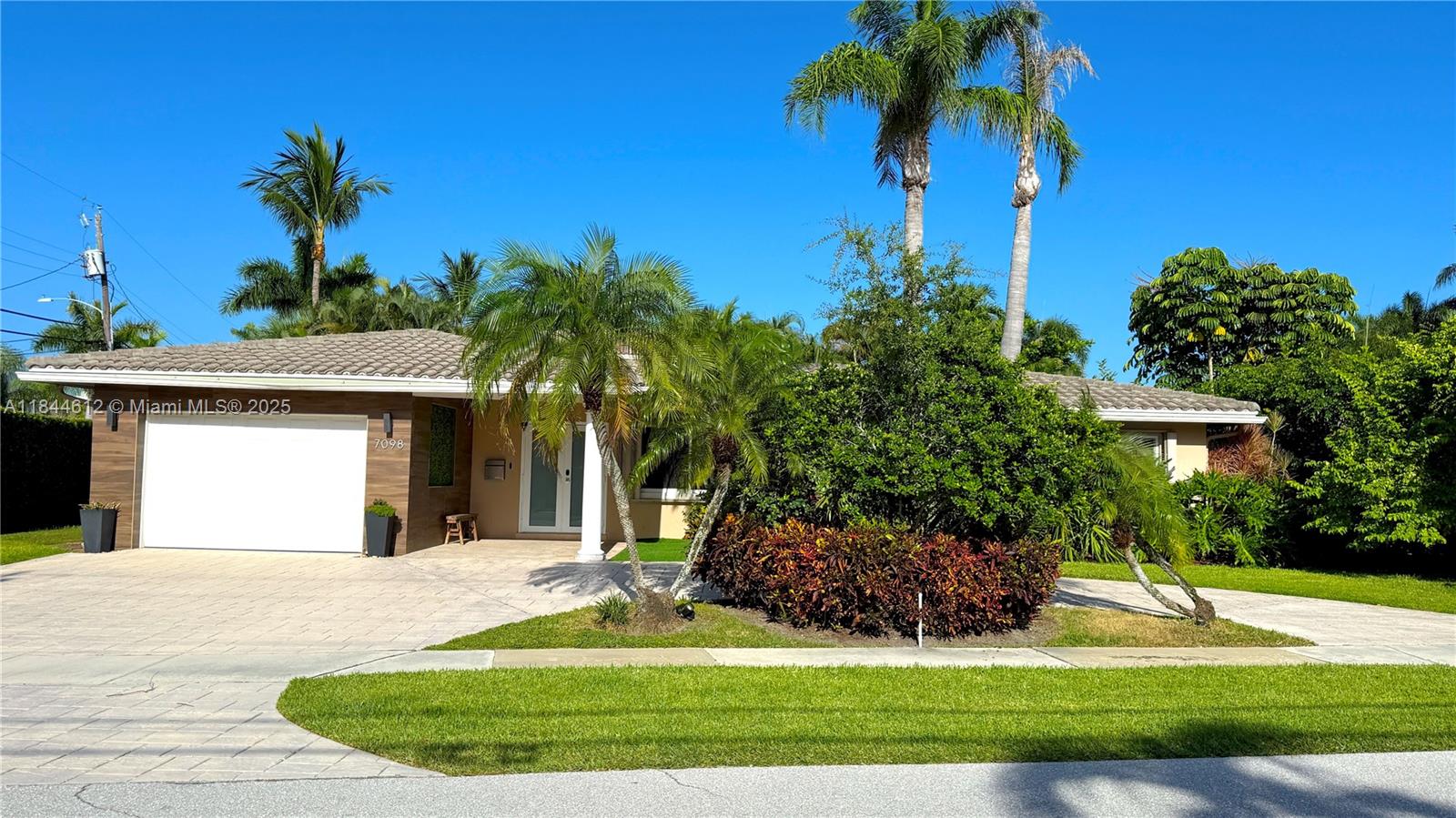 Welcome to Paradise! Fully renovated 3 BR / 2 Bath, Pool home and two car garage, in a prime location close to the beach and top - rated Schools.this home offers the open-concept design creates a seamless flow between the living, dining, & kitchen areas and White kitchen with granite counters, stainless appliances, hurricane impact doors. The spacious backyard features a large pool, perfect for enjoying a refreshing swim or hosting poolside gatherings and kids playground.Located in the multi-million dollar waterfront community Boca Harbour with easy access to shopping, restaurants and beaches.