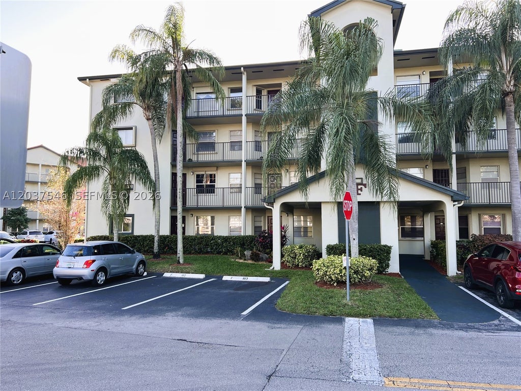 Photo of 1300 SW 130th Ave #101F, Pembroke Pines, FL 33027 (MLS # A12037546)