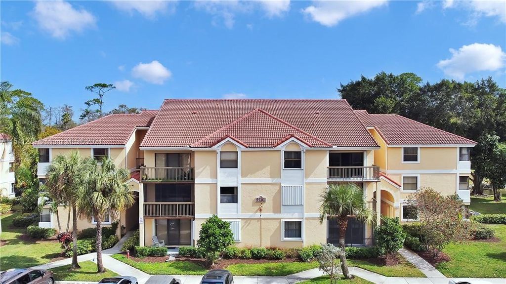 Photo of 5761 Riverside Dr #205B4, Coral Springs, FL 33067 (MLS # A11541279)