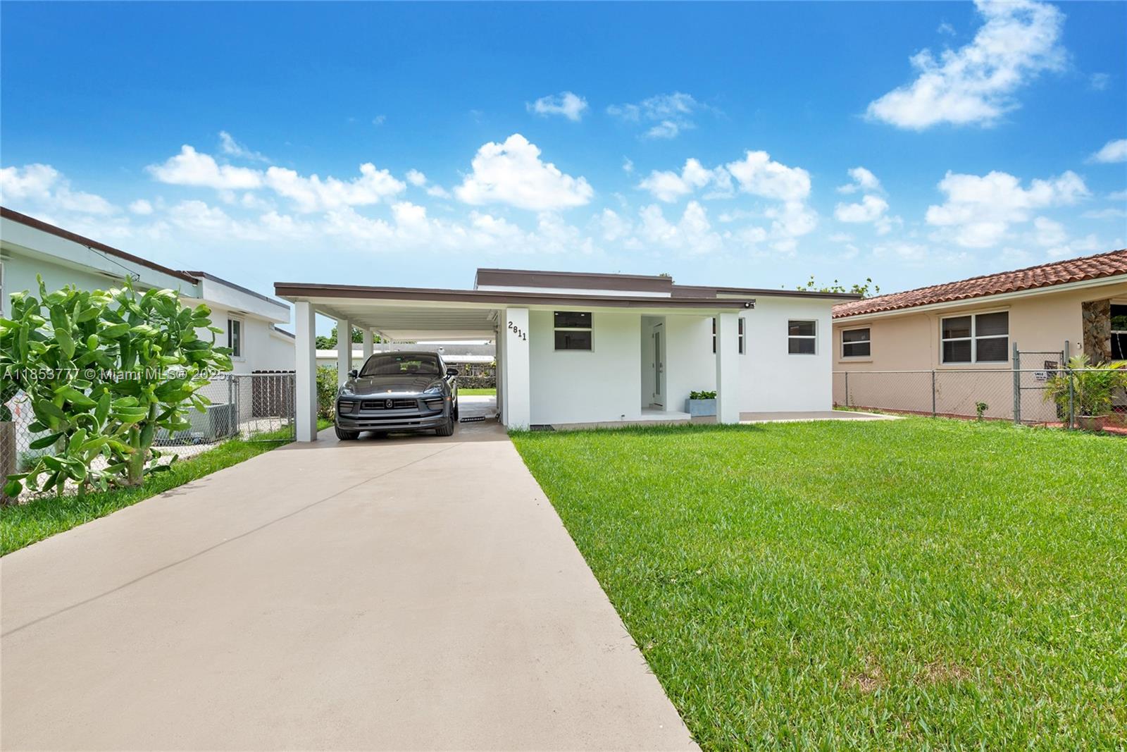 Step into this beautifully renovated 2-bedroom, 2-bathroom home offering comfort, style, and a spacious garden. The home features a bright, open layout with updated finishes throughout, including a modern renovated kitchen and bathrooms. Enjoy the expansive fenced-in yard—perfect for entertaining, gardening, or simply relaxing. A covered carport and long driveway provide ample parking. This charming residence is move-in ready and ideal for enjoying indoor-outdoor living in South Florida. Don’t miss this incredible opportunity!