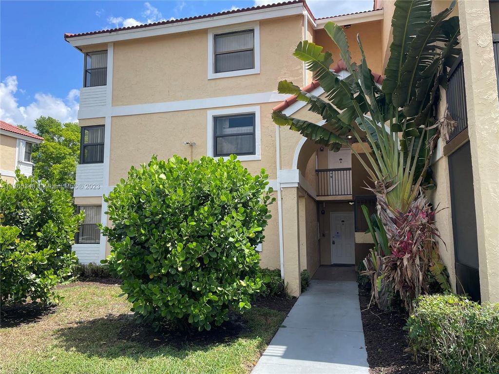 Photo of 5661 Riverside Dr #101B7, Coral Springs, FL 33067 (MLS # A11365348)