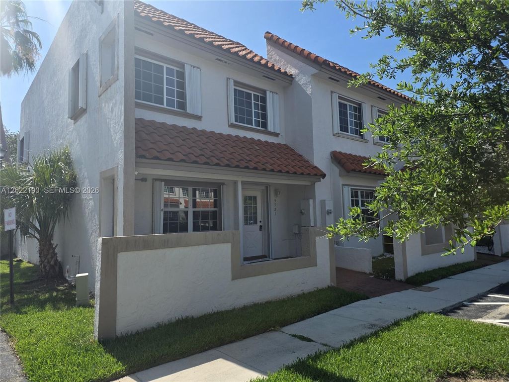 Photo of 9521 NW 42nd St #9521, Sunrise, FL 33351 (MLS # A12022190)