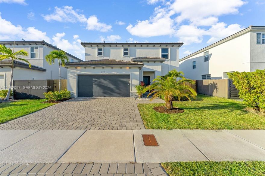 Rare opportunity to own a 2022-built 4-bedroom, 2.5-bath home with NO HOA. This modern home features luxury vinyl plank flooring throughout, an open-concept layout, and a spacious living area perfect for entertaining. The home also includes a finished two-car garage with a storage room, providing valuable extra space rarely found in similar homes. Step outside to a beautifully landscaped backyard that creates a private, resort-like setting, with plenty of room to build your dream pool or design your ideal outdoor retreat. Additional features include accordion hurricane shutters for added protection, an updated bathroom, and the peace of mind of owning a newer construction home built in 2022. Conveniently located just minutes from Florida’s Turnpike, shopping, dining, and Black Point Marina, making commuting and weekend activities effortless. Homes this new, upgraded, and without HOA restrictions rarely come available. Schedule your showing today.